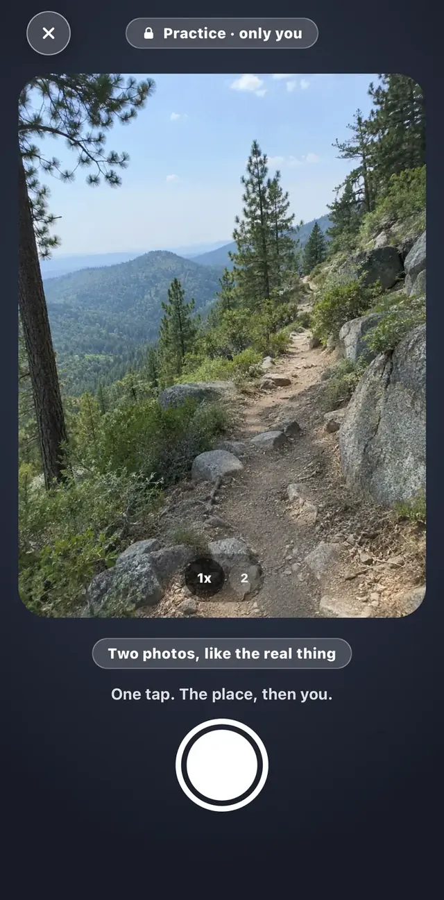 Vetta's practice camera: the trail fills the frame. One tap. The place, then you.